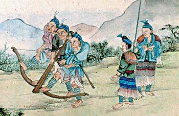 Ancient Chinese soldiers loading a crossbow