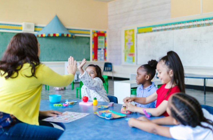 Teacher with students